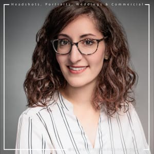 Professional headshot of a businesswoman with a confident smile